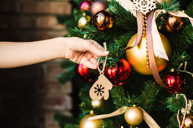 Decorating a holiday tree